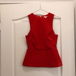 Red tank with side cut out